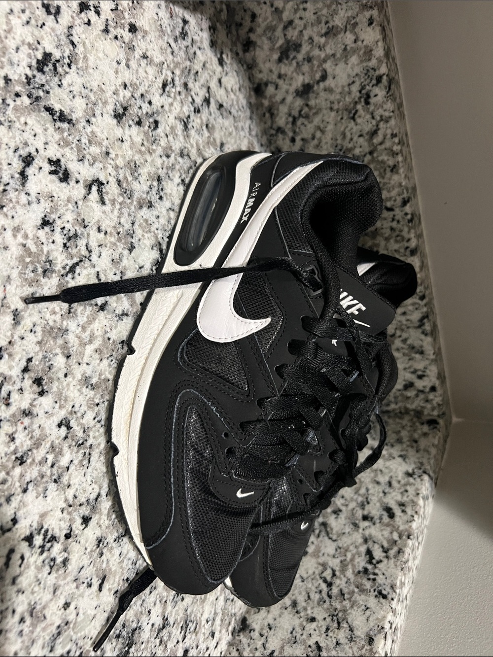 Nike Women's Black and White Trainers with Air Cushioning
